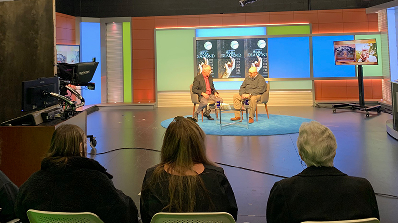 Profs. Franco (left) and Billman discuss “War on the Diamond.”