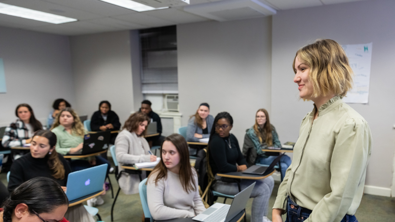 Taylor Bigelow, Ph.D. Teaching Clinical Mental Health students in-person.