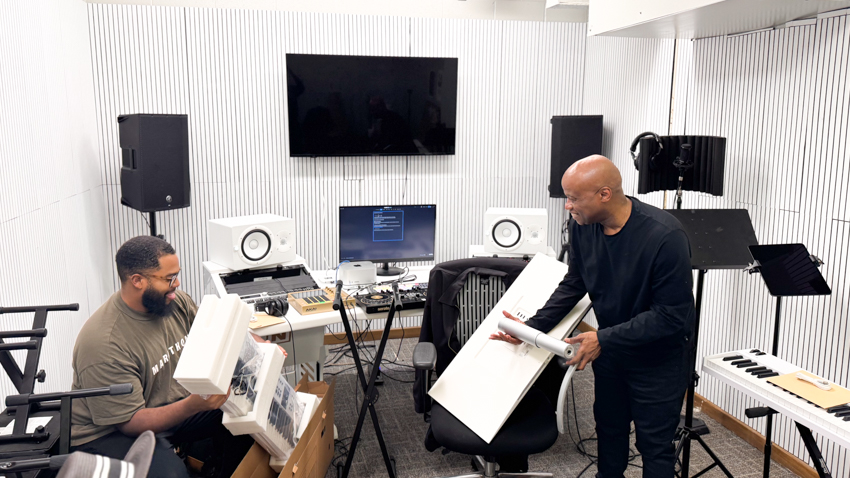Dr. Horton and Travis Scott, the in house producer, setting up the new music studio made possible thanks to the Mellon Foundation Grant.