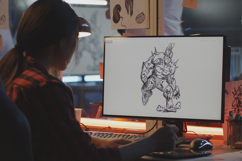 Graphic designer at computer