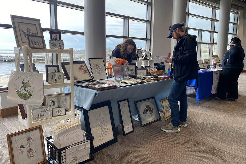 Vendor selling framed art