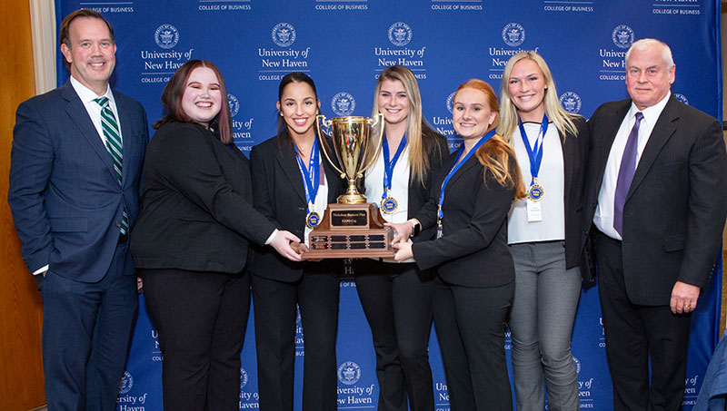 Image of business students at expo.