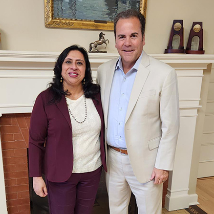 Ranjana Maitra /U+0026#x27;91 MBA and Dr. Sheahon Zenger, interim president.