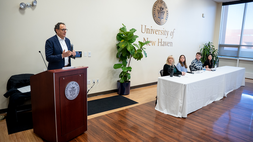 David Sussman leads a panel discussion