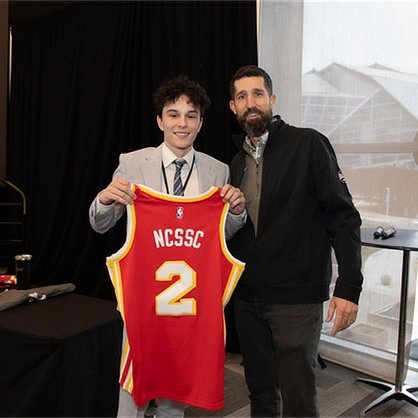 Jake Dykas ’25, ’26 MBA (left)