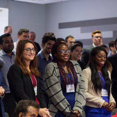 Business students standing in class