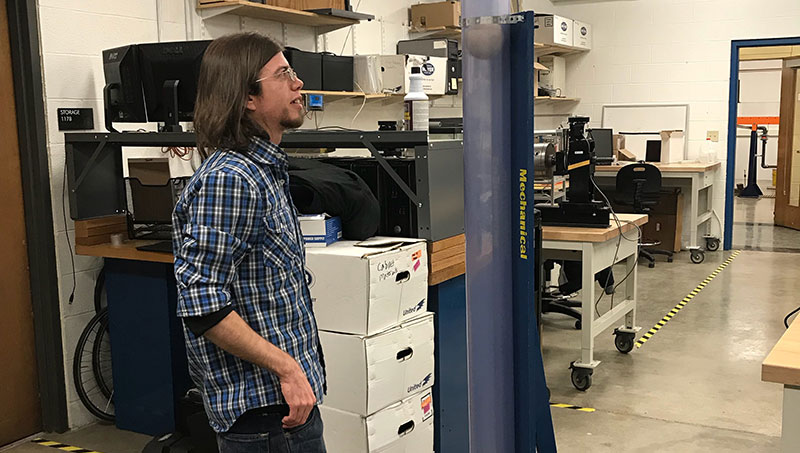 Image of Tristan Cowan ’15’s machine measures his height.