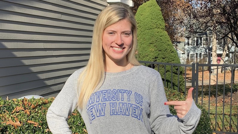 Image of Karli Ricciuti in a University t-shirt.