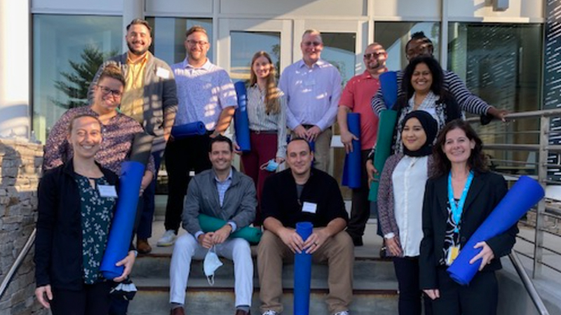 Front row: Patty Cavaleri and Dr. Jill Moore. Middle row: Trisha Wain, Joe Haddad, Tim Millard, Sumbul Yousafi. Last row: Lindsay Roehre, Aaron Marks, Melissa Yates, Todd Schettini, Jeff Shuman, Shanice Tricoche, Purvi Mehta.