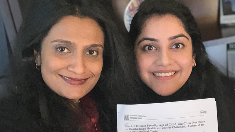 Pavani Rangachari, Ph.D., CPH (left) and Dr. Niharika Pathak ’23 MHA with their article.