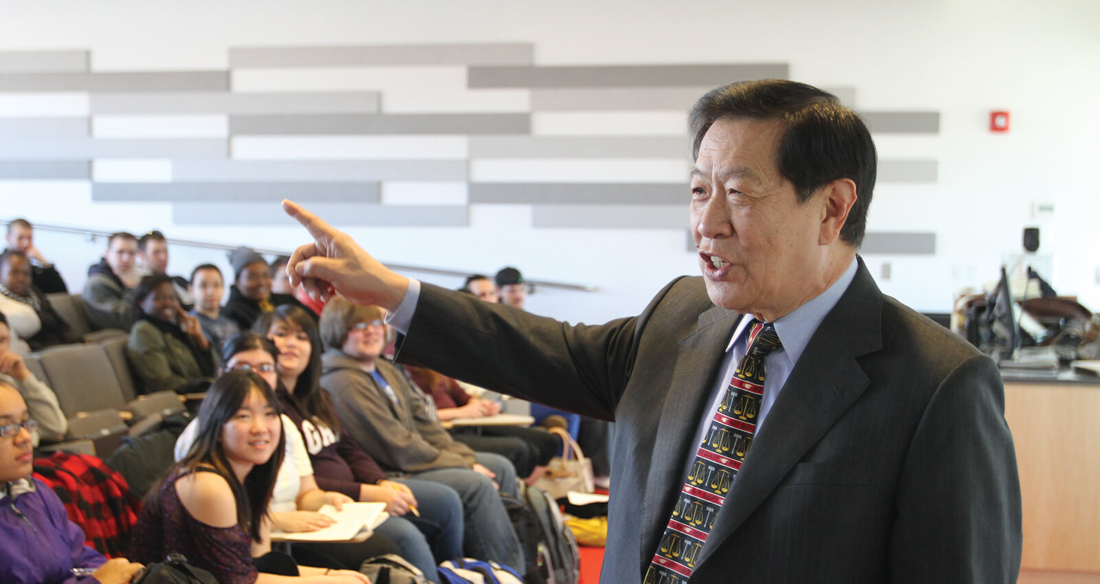 The late Henry C. Lee, Ph.D., teaches a class in the Institute named in his honor.