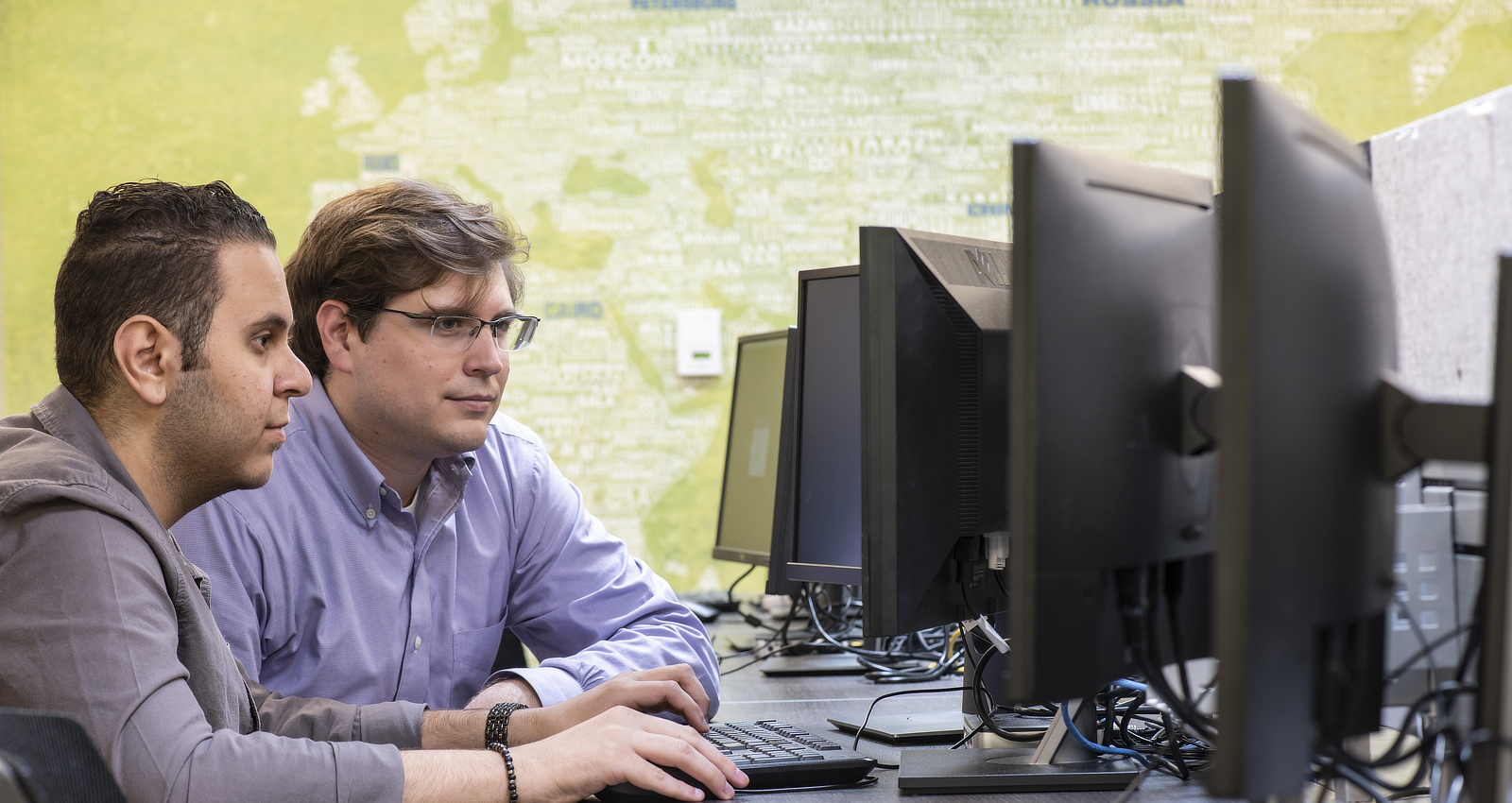 Men at computer