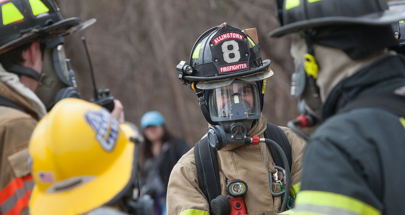 Firefighter in mask and gear