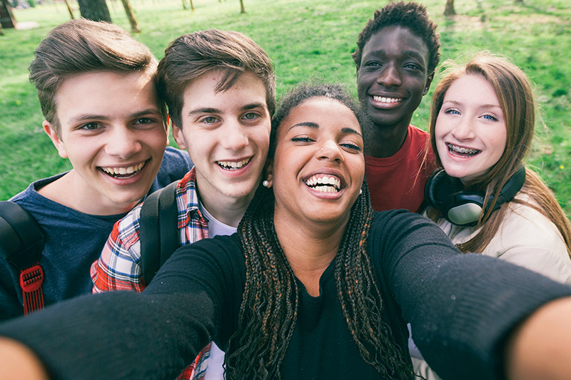 Happy students taking selfie