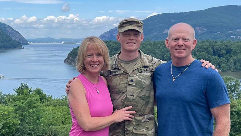 Kevin Boyle '24 with his parents Michael and Julie Boyle after graduation.