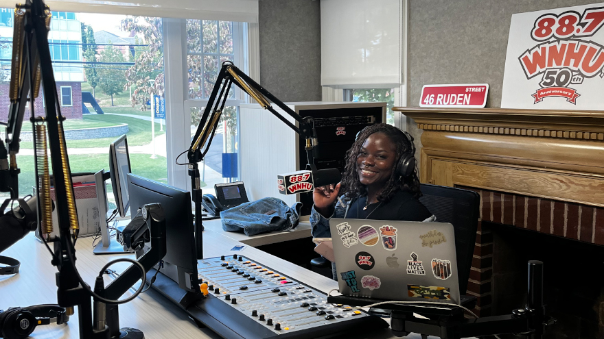 Oluwatoyosi Tomiwa Kehinde ’26 M.S. at the WNHU radio station