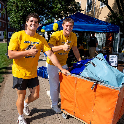 University of New Haven athletes helped Chargers and their families move onto campus.