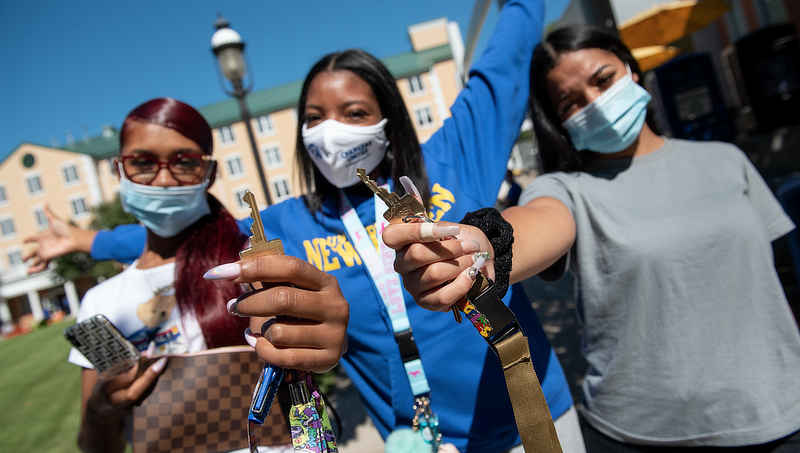 Students with new dorm room keys
