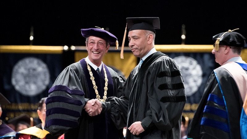 Shelley Stewart with President Kaplan at graduation.