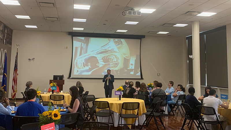 Dr. Sheahon Zenger (center) welcomes incoming students and their families.