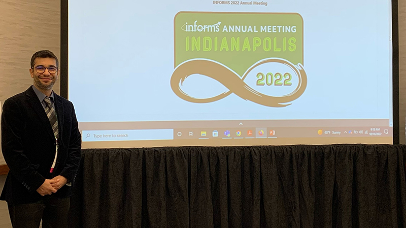 Gazi Murat Duman, Ph.D., at the INFORMS annual conference.