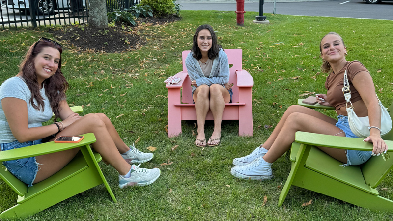 Mikaela Motz ’27 with a couple friends on campus
