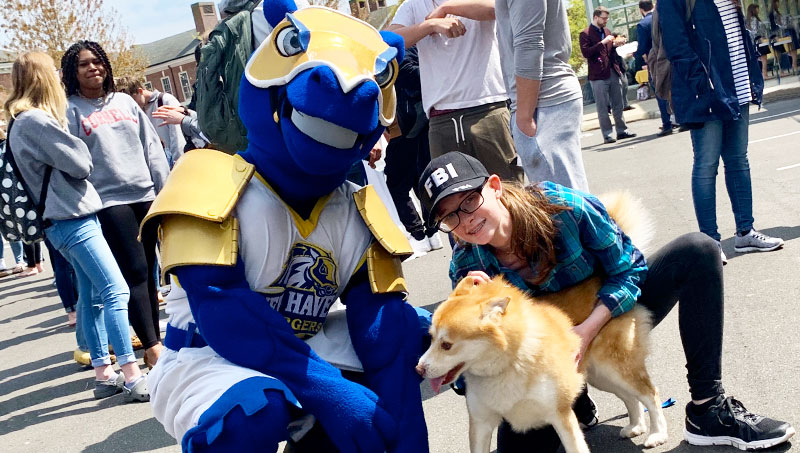 Image of Charlie celebrating Founders Day with students.