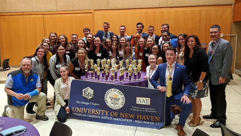 Members of the University's ACJA chapter