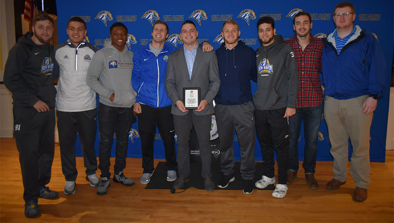 Image of Christopher Liggio ’20 and his teammates.