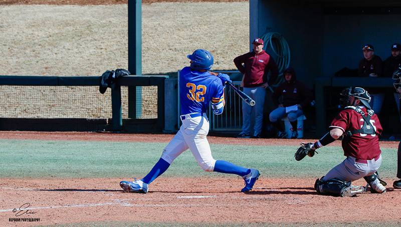 Matthew Chamberlain playing baseball.