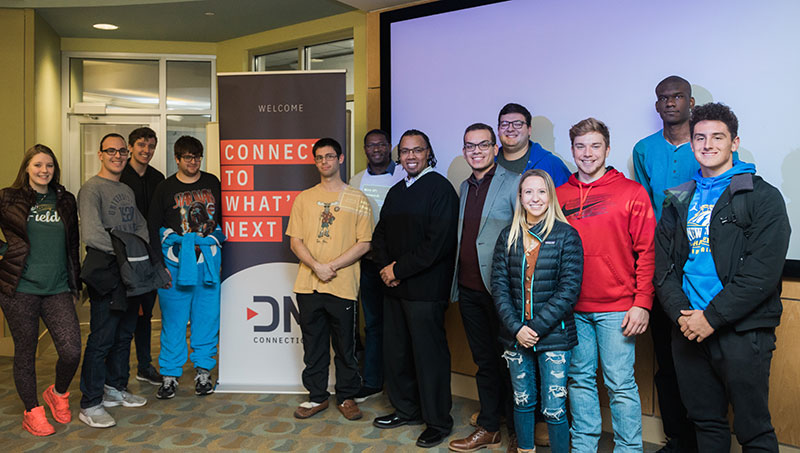 Image of Carlton Pitts and students.