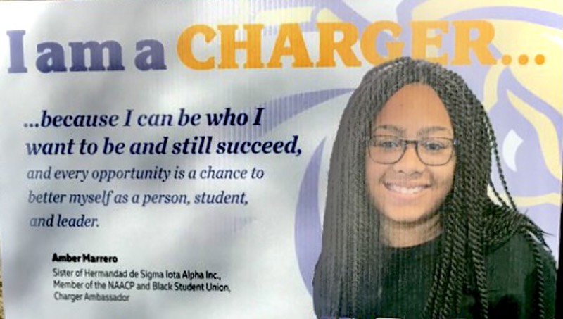 Amber Marrero/U+0026#x27;s picture on University lawn sign. 