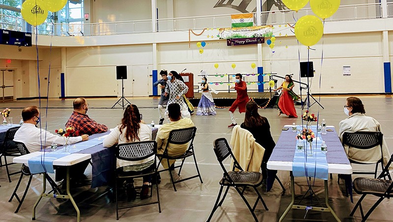Image of dancers at the Universty/U+0026#x27;s Diwali celebration.