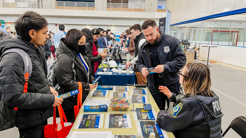 Students talking with members of the Stratford Police Department
