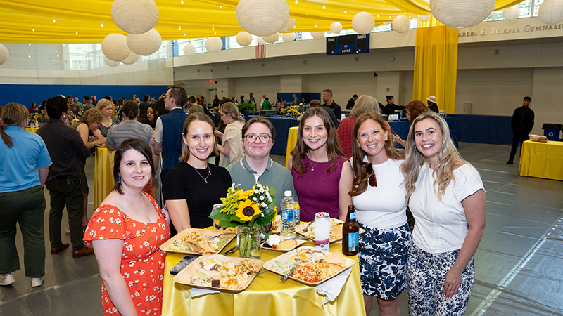Six women around a table.