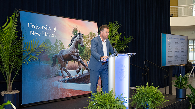 President Frederiksen welcomes guests at the Chargers Celebrate event.