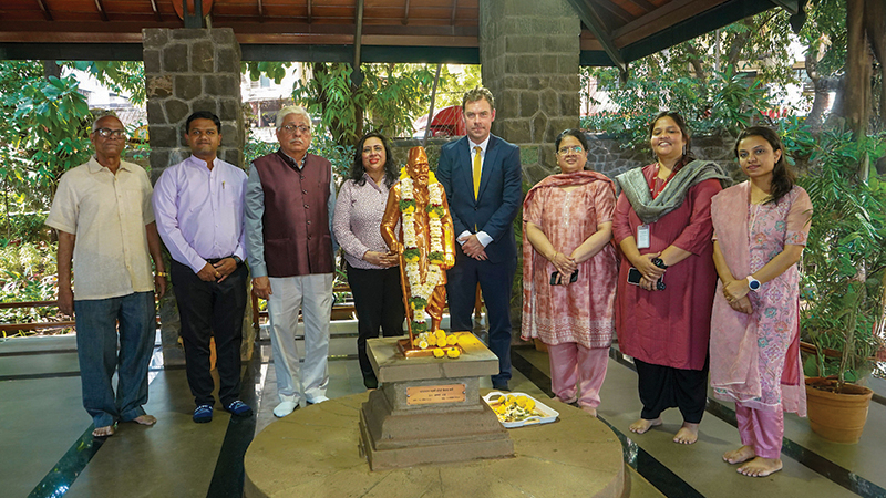 President Frederiksen with Ranjana Maitra and several other people in India.