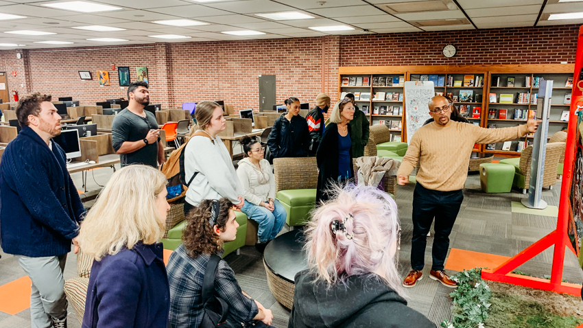 Hector Rodriguez speaking at the reception for Resilience, Reflection, and Reclamation at the Marvin K. Peterson Library
