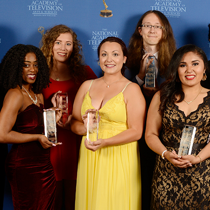 Students holding awards