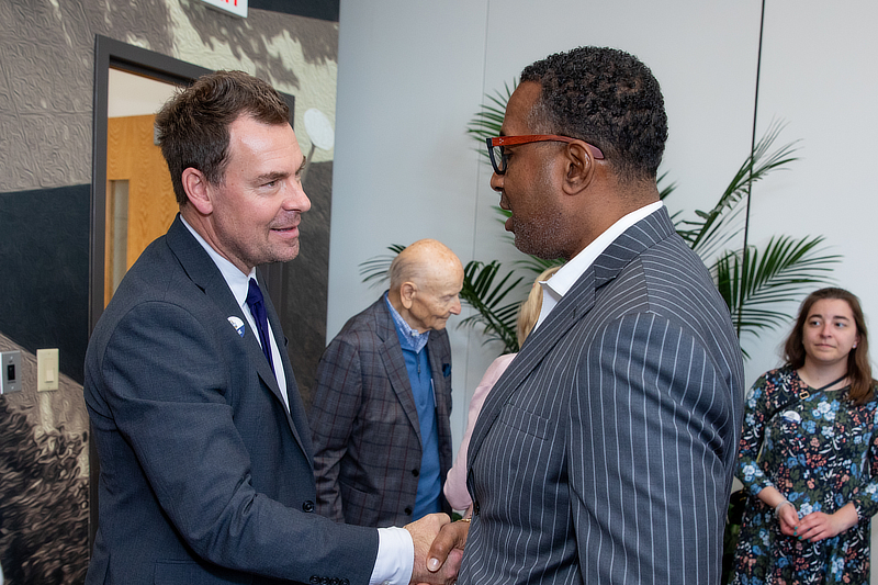 President Frederiksen shaking hands